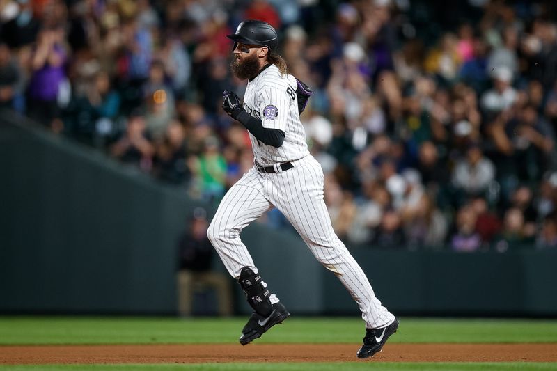 May 26, 2023; Denver, Colorado, USA; Colorado Rockies designated hitter Charlie Blackmon (19) rounds the bases on a solo home run in the eighth inning against the New York Mets at Coors Field. Mandatory Credit: Isaiah J. Downing-USA TODAY Sports