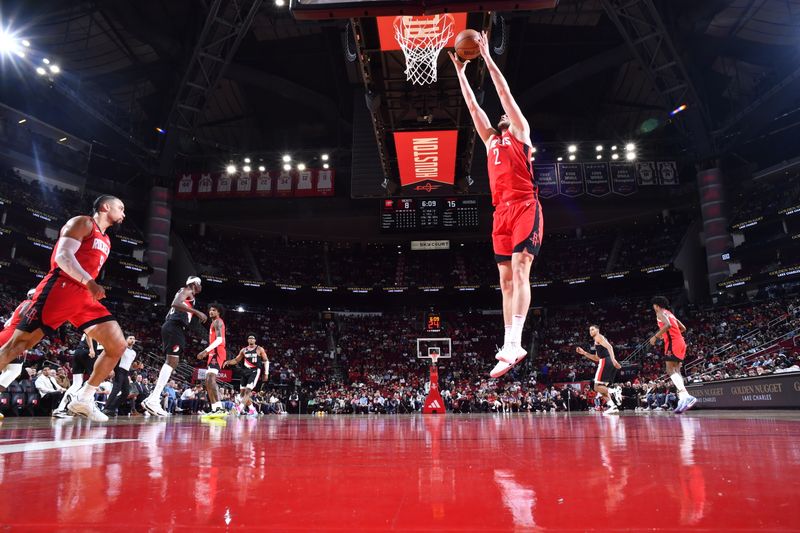 HOUSTON, TX - MARCH 25: Jock Landale #2 of the Houston Rockets rebounds the ball during the game against the Portland Trail Blazers on March 25, 2024 at the Toyota Center in Houston, Texas. NOTE TO USER: User expressly acknowledges and agrees that, by downloading and or using this photograph, User is consenting to the terms and conditions of the Getty Images License Agreement. Mandatory Copyright Notice: Copyright 2024 NBAE (Photo by Logan Riely/NBAE via Getty Images)