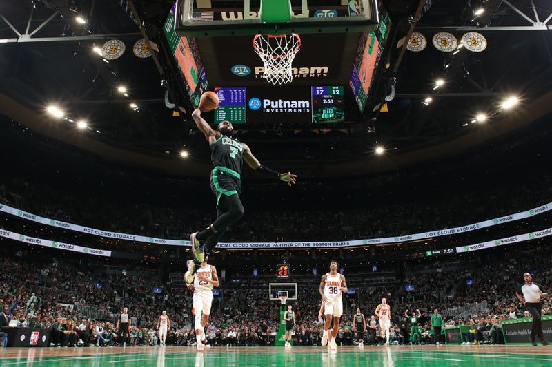 BOSTON, MA - FEBRUARY 3: Jaylen Brown #7 of the Boston Celtics dunks the ball during the game against the Phoenix Suns on February 3, 2023 at TD Garden in Boston, Massachusetts.  NOTE TO USER: User expressly acknowledges and agrees that, by downloading and or using this photograph, User is consenting to the terms and conditions of the Getty Images License Agreement. Mandatory Copyright Notice: Copyright 2022 NBAE  (Photo by Nathaniel S. Butler/NBAE via Getty Images)