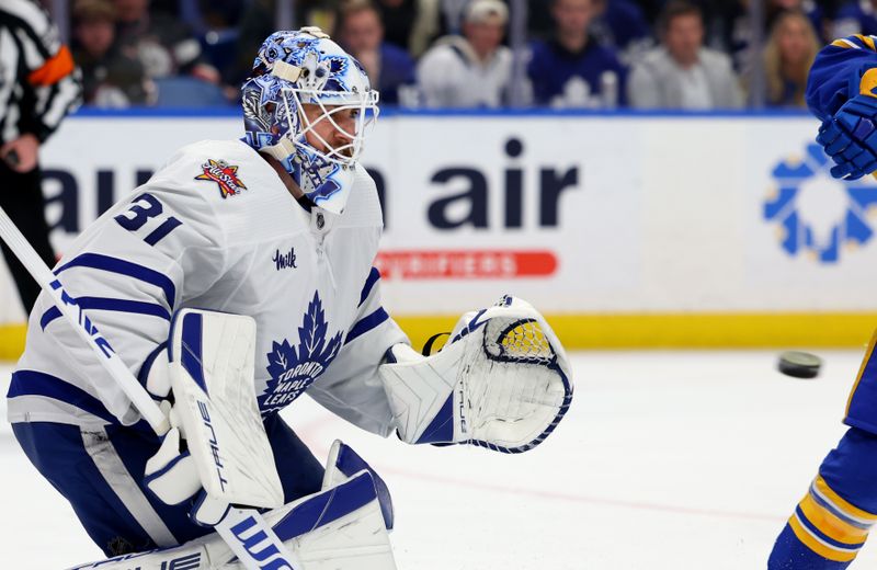 Dec 21, 2023; Buffalo, New York, USA;  Toronto Maple Leafs goaltender Martin Jones (31) looks to make a save during the second period against the Buffalo Sabres at KeyBank Center. Mandatory Credit: Timothy T. Ludwig-USA TODAY Sports