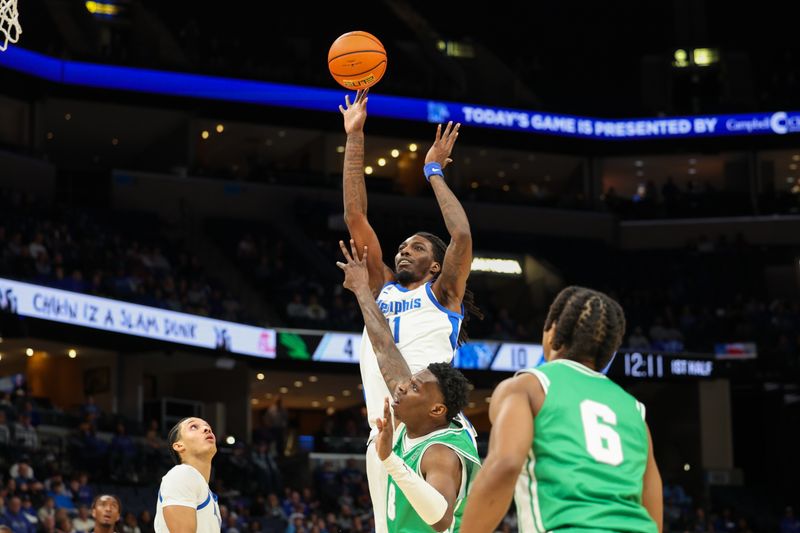Dec 31, 2025; Memphis, Tennessee, USA; Memphis Tigers forward Aaron Bradshaw (11) shoots the ball against the North Texas Mean Green during the first half at FedExForum. Mandatory Credit: Wesley Hale-Imagn Images