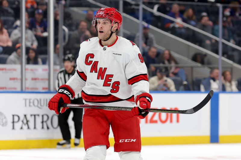 Jan 25, 2025; Elmont, New York, USA; Carolina Hurricanes right wing Mikko Rantanen (96) skates against the New York Islanders during the first period at UBS Arena. Mandatory Credit: Brad Penner-Imagn Images