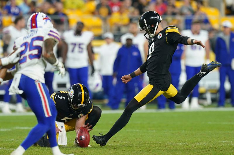 Pittsburgh Steelers kicker Chris Boswell kicks a 43-yard field goal with Cameron Johnston (5) during the first half of an NFL preseason football game against the Buffalo Bills, Saturday, Aug. 17, 2024, in Pittsburgh. (AP Photo/Matt Freed)