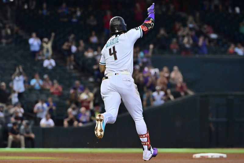 Sep 20, 2023; Phoenix, Arizona, USA;  Arizona Diamondbacks second baseman Ketel Marte (4) celebrates after hitting a solo home run in the seventh inning  against the San Francisco Giants at Chase Field. Mandatory Credit: Matt Kartozian-USA TODAY Sports