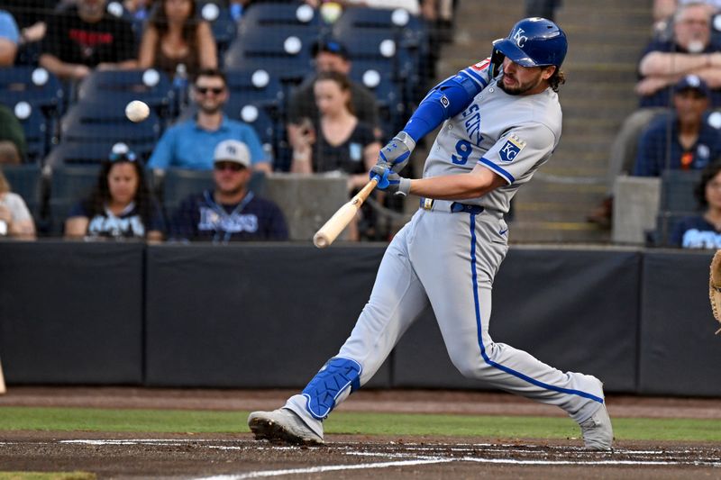 Apr 30, 2025; St. Petersburg, Florida, USA; Kansas City Royals first baseman Vinnie Pasquantino (9) hits a two-run home run in the first inning against the Tampa Bay Rays at George M. Steinbrenner Field. Mandatory Credit: Jonathan Dyer-Imagn Images