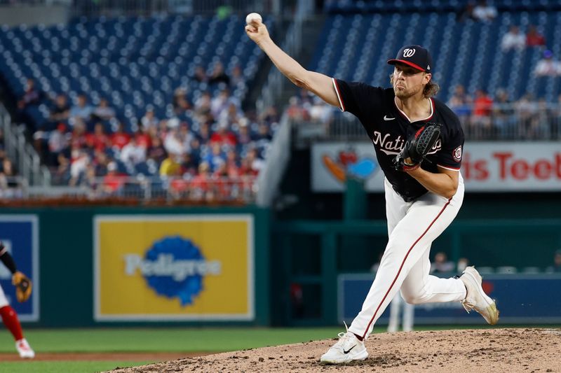 Sep 11, 2024; Washington, District of Columbia, USA; Washington Nationals starting itcher Jake Irvin (27) pitches against the Atlanta Braves during the third inning at Nationals Park. Mandatory Credit: Geoff Burke-Imagn Images