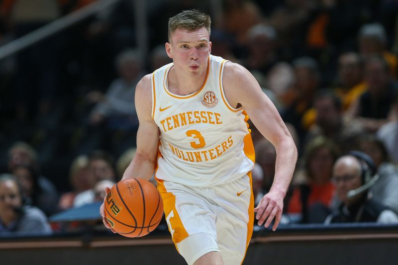 Dec 5, 2023; Knoxville, Tennessee, USA; Tennessee Volunteers guard Dalton Knecht (3) moves the ball against the George Mason Patriots during the first half at Thompson-Boling Arena at Food City Center. Mandatory Credit: Randy Sartin-USA TODAY Sports