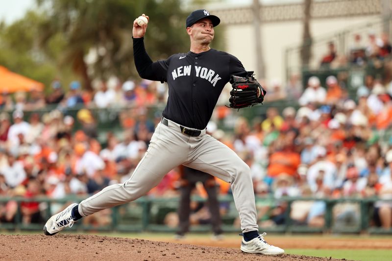 Mar 2, 2024; Sarasota, Florida, USA; New York Yankees relief pitcher Cody Morris (82) throws a pitch during the fifth inning against the Baltimore Orioles at Ed Smith Stadium. Mandatory Credit: Kim Klement Neitzel-USA TODAY Sports