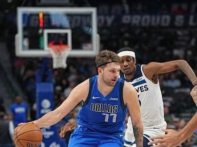 DALLAS, TX - DECEMBER 14: Luka Doncic #77 of the Dallas Mavericks dribbles the ball during the game against the Minnesota Timberwolves on December 14, 2023 at the American Airlines Center in Dallas, Texas. NOTE TO USER: User expressly acknowledges and agrees that, by downloading and or using this photograph, User is consenting to the terms and conditions of the Getty Images License Agreement. Mandatory Copyright Notice: Copyright 2023 NBAE (Photo by Glenn James/NBAE via Getty Images)