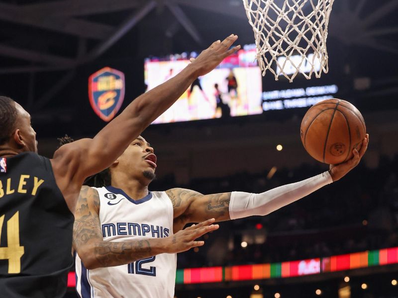 CLEVELAND, OH - FEBUARY 2:  Ja Morant #12 of the Memphis Grizzlies drives to the basket during the game on Febuary 2, 2023 at Rocket Mortgage FieldHouse in Cleveland, Ohio. NOTE TO USER: User expressly acknowledges and agrees that, by downloading and/or using this Photograph, user is consenting to the terms and conditions of the Getty Images License Agreement. Mandatory Copyright Notice: Copyright 2023 NBAE (Photo by  Lauren Bacho/NBAE via Getty Images)