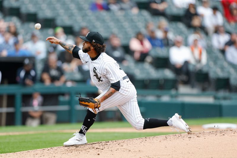 Sep 27, 2023; Chicago, Illinois, USA; Chicago White Sox relief pitcher Deivi Garcia (64) delivers a pitch against the Arizona Diamondbacks during the third inning at Guaranteed Rate Field. Mandatory Credit: Kamil Krzaczynski-USA TODAY Sports