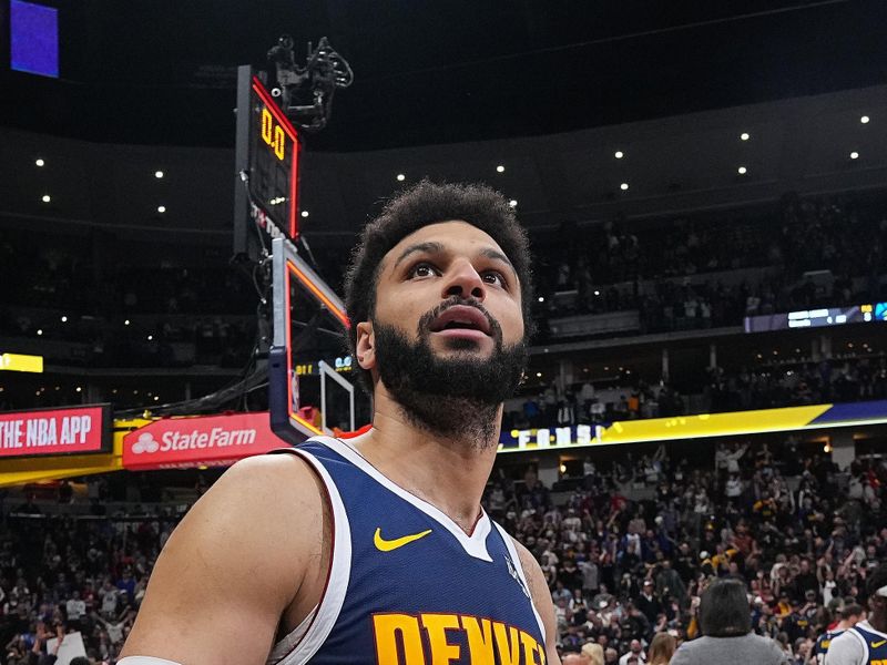 DENVER, CO - APRIL 10:  Jamal Murray #27 of the Denver Nuggets looks on after the game against the Minnesota Timberwolves on April 10, 2024 at the Ball Arena in Denver, Colorado. NOTE TO USER: User expressly acknowledges and agrees that, by downloading and/or using this Photograph, user is consenting to the terms and conditions of the Getty Images License Agreement. Mandatory Copyright Notice: Copyright 2024 NBAE (Photo by Bart Young/NBAE via Getty Images)