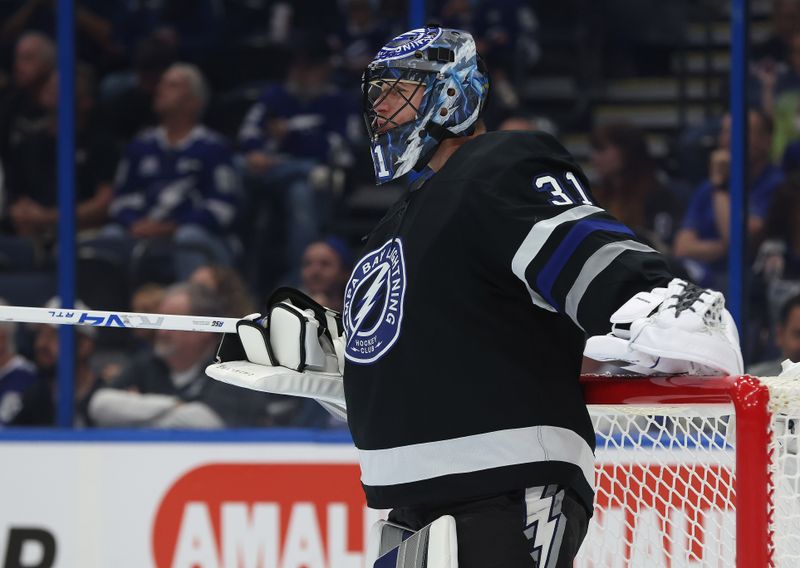Oct 25, 2025; Tampa, Florida, USA; Tampa Bay Lightning goaltender Jonas Johansson (31) looks on against the Anaheim Ducks during the second period at Benchmark International Arena. Mandatory Credit: Kim Klement Neitzel-Imagn Images