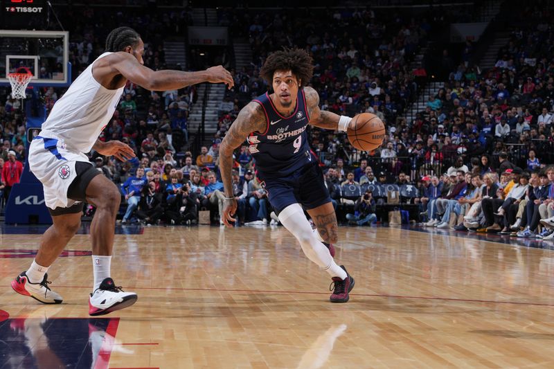 PHILADELPHIA, PA - MARCH 27: Kelly Oubre Jr. #9 of the Philadelphia 76ers dribbles the ball during the game /acl on March 27, 2024 at the Wells Fargo Center in Philadelphia, Pennsylvania NOTE TO USER: User expressly acknowledges and agrees that, by downloading and/or using this Photograph, user is consenting to the terms and conditions of the Getty Images License Agreement. Mandatory Copyright Notice: Copyright 2024 NBAE (Photo by Jesse D. Garrabrant/NBAE via Getty Images)