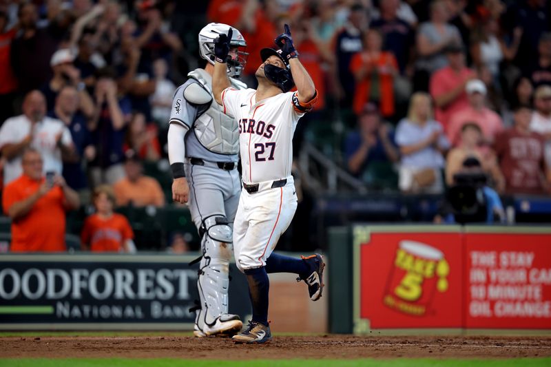Aug 18, 2024; Houston, Texas, USA; Houston Astros designated hitter Jose Altuve (27) crosses home plate after hitting a home run to left field against the Chicago White Sox during the eighth inning at Minute Maid Park. Mandatory Credit: Erik Williams-USA TODAY Sports