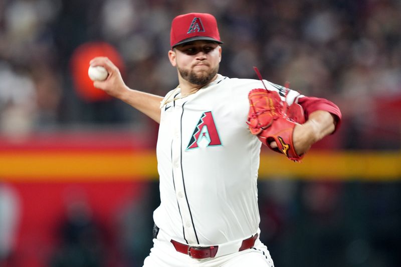 May 3, 2024; Phoenix, Arizona, USA; Arizona Diamondbacks pitcher Slade Cecconi (43) pitches against the San Diego Padres during the fifth inning at Chase Field. Mandatory Credit: Joe Camporeale-USA TODAY Sports