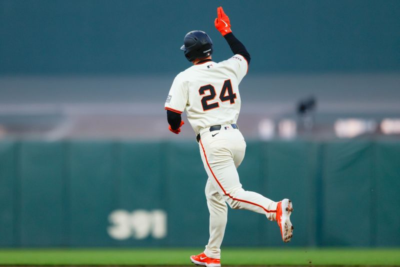 Jun 24, 2024; San Francisco, California, USA; San Francisco Giants third base Matt Chapman rounds the bases after hitting a one-run home run during the fifth inning against the Chicago Cubs at Oracle Park. All Giants players wore the number 24 in honor of Giants former player Willie Mays. Mandatory Credit: Sergio Estrada-USA TODAY Sports