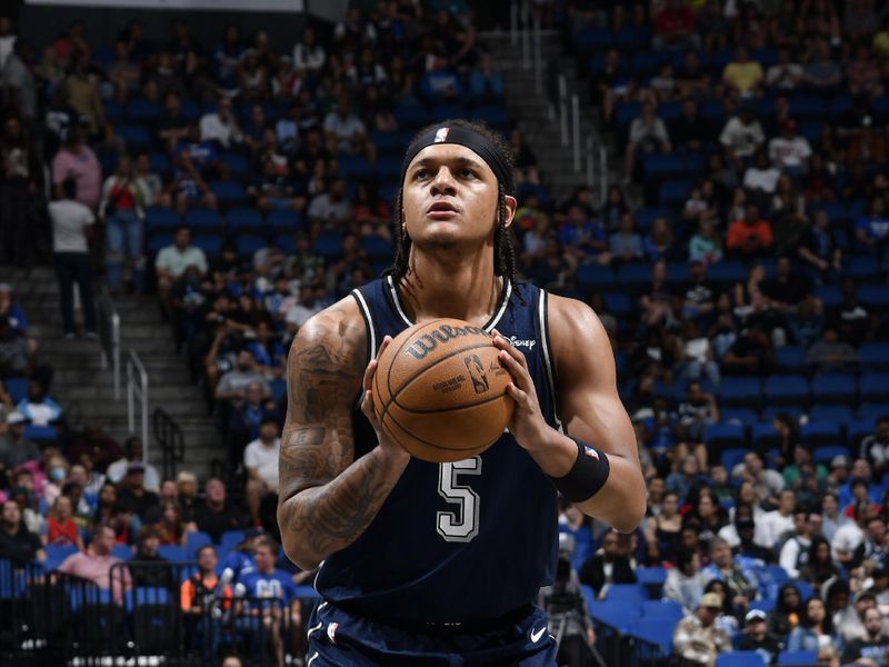 ORLANDO, FL - MARCH 17: Paolo Banchero #5 of the Orlando Magic shoots a free throw during the game against the Toronto Raptors on March 17, 2024 at the Kia Center in Orlando, Florida. NOTE TO USER: User expressly acknowledges and agrees that, by downloading and or using this photograph, User is consenting to the terms and conditions of the Getty Images License Agreement. Mandatory Copyright Notice: Copyright 2024 NBAE (Photo by Fernando Medina/NBAE via Getty Images)