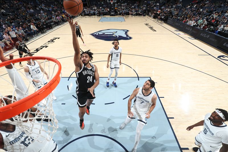 MEMPHIS, TN - February 26:  Cam Thomas #24 of the Brooklyn Nets drives to the basket during the game against the Memphis Grizzlies on February 26, 2024 at FedExForum in Memphis, Tennessee. NOTE TO USER: User expressly acknowledges and agrees that, by downloading and or using this photograph, User is consenting to the terms and conditions of the Getty Images License Agreement. Mandatory Copyright Notice: Copyright 2024 NBAE (Photo by Joe Murphy/NBAE via Getty Images)