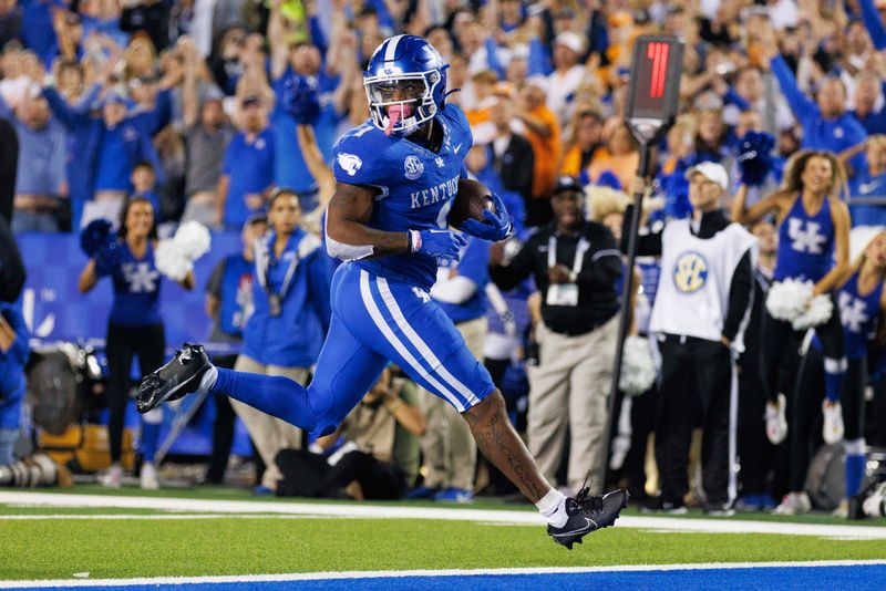 Oct 28, 2023; Lexington, Kentucky, USA; Kentucky Wildcats running back Ray Davis (1) carries the ball into the end zone for a touchdown during the second quarter against the Tennessee Volunteers at Kroger Field. Mandatory Credit: Jordan Prather-USA TODAY Sports