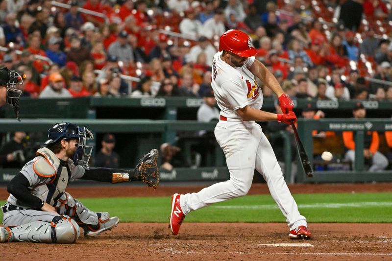 May 5, 2023; St. Louis, Missouri, USA;  St. Louis Cardinals shortstop Paul DeJong (11) hits single against the Detroit Tigers during the eighth inning at Busch Stadium. Mandatory Credit: Jeff Curry-USA TODAY Sports