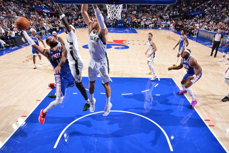 PHILADELPHIA, PA - OCTOBER 23: Caleb Martin #16 of the Philadelphia 76ers drives to the basket during the game against the Milwaukee Bucks on October 23, 2024 at the Wells Fargo Center in Philadelphia, Pennsylvania NOTE TO USER: User expressly acknowledges and agrees that, by downloading and/or using this Photograph, user is consenting to the terms and conditions of the Getty Images License Agreement. Mandatory Copyright Notice: Copyright 2024 NBAE (Photo by Jesse D. Garrabrant/NBAE via Getty Images)