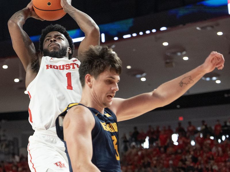 Jan 6, 2024; Houston, Texas, USA; Houston Cougars guard Jamal Shead (1) scores against West Virginia Mountaineers guard Kerr Kriisa (3) in the second half at Fertitta Center. Mandatory Credit: Thomas Shea-USA TODAY Sports