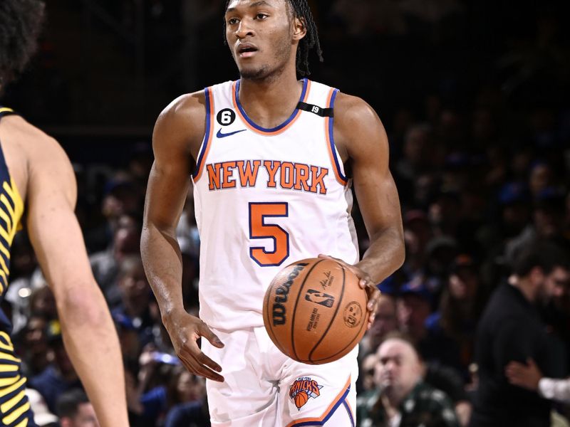 NEW YORK, NY - APRIL 9: Immanuel Quickley #5 of the New York Knicks dribbles the ball during the game against the Indiana Pacers on April 9, 2023 at Madison Square Garden in New York City, New York. NOTE TO USER: User expressly acknowledges and agrees that, by downloading and or using this photograph, User is consenting to the terms and conditions of the Getty Images License Agreement. Mandatory Copyright Notice: Copyright 2023 NBAE  (Photo by David Dow/NBAE via Getty Images)