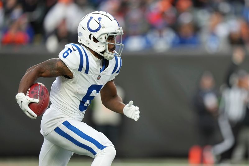 Indianapolis Colts wide receiver Isaiah McKenzie (6) returns a kick-off during an NFL football game against the Cincinnati Bengals, Sunday, Dec. 10, 2023, in Cincinnati, OH. (AP Photo/Peter Joneleit)