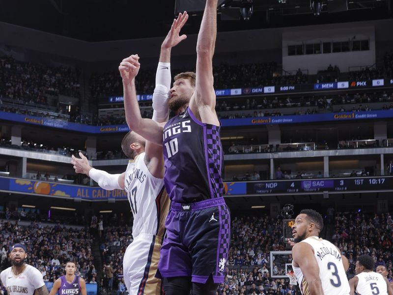 SACRAMENTO, CA - JANUARY 7:  Domantas Sabonis #10 of the Sacramento Kings goes to the basket during the game on January 7, 2024 at Golden 1 Center in Sacramento, California. NOTE TO USER: User expressly acknowledges and agrees that, by downloading and or using this Photograph, user is consenting to the terms and conditions of the Getty Images License Agreement. Mandatory Copyright Notice: Copyright 2024 NBAE (Photo by Rocky Widner/NBAE via Getty Images)