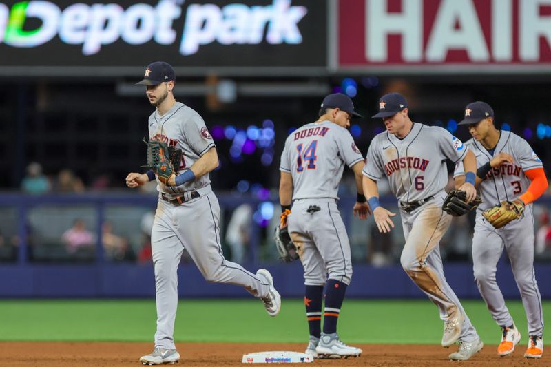 Aug 15, 2023; Miami, Florida, USA; Houston Astros right fielder Kyle Tucker (30) celebrates with teammates after defeating the Miami Marlins at loanDepot Park. Mandatory Credit: Sam Navarro-USA TODAY Sports