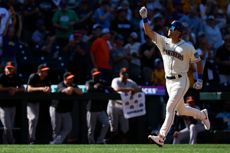 Aug 13, 2023; Seattle, Washington, USA; Seattle Mariners right fielder Dominic Canzone (8) reacts after hitting a solo-home run against the Baltimore Orioles during the ninth inning at T-Mobile Park. Mandatory Credit: Joe Nicholson-USA TODAY Sports