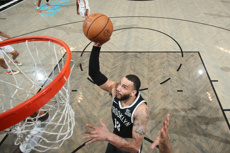BROOKLYN, NY - MARCH 16: Tyrese Martin #13 of the Brooklyn Nets drives to the basket during the game against the Atlanta Hawks on March 16, 2025 at Barclays Center in Brooklyn, New York. NOTE TO USER: User expressly acknowledges and agrees that, by downloading and or using this Photograph, user is consenting to the terms and conditions of the Getty Images License Agreement. Mandatory Copyright Notice: Copyright 2025 NBAE (Photo by Nathaniel S. Butler/NBAE via Getty Images)