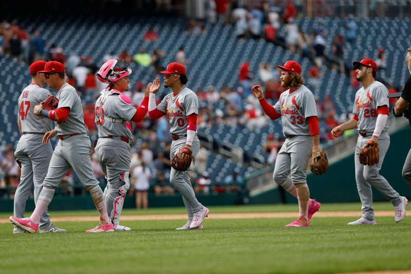 May 11, 2025; Washington, District of Columbia, USA; St. Louis Cardinals players celebrate after their game against the Washington Nationals at Nationals Park. Mandatory Credit: Geoff Burke-Imagn Images