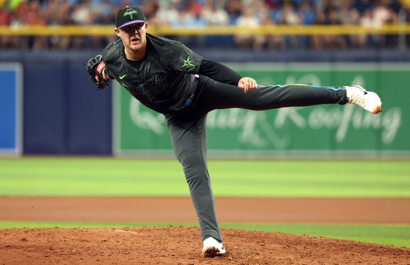 May 4, 2024; St. Petersburg, Florida, USA; Tampa Bay Rays pitcher Garrett Cleavinger (60) throws a pitch against the New York Mets during the seventh inning at Tropicana Field. Mandatory Credit: Kim Klement Neitzel-USA TODAY Sports