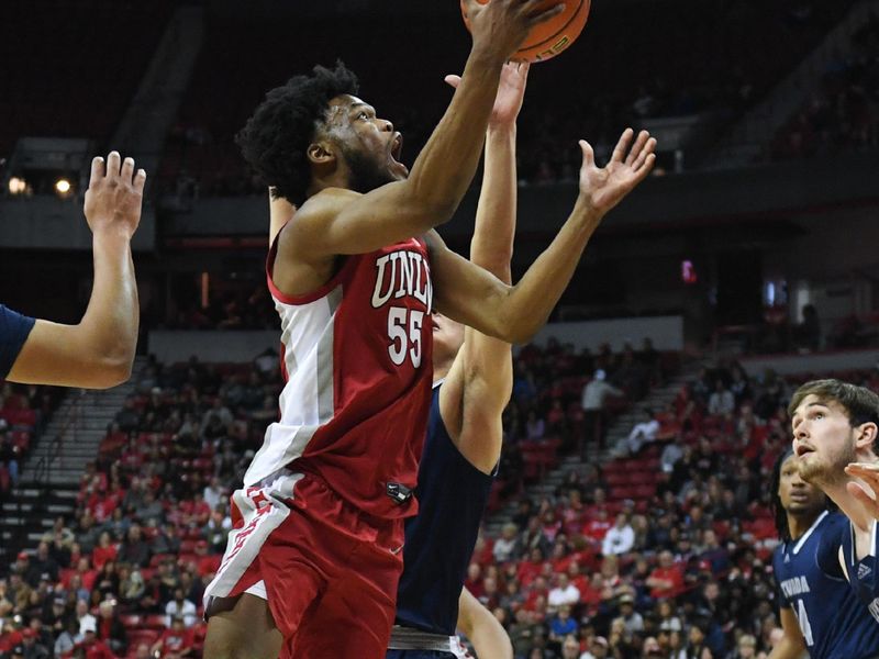 Jan 28, 2023; Las Vegas, Nevada, USA; UNLV Runnin' Rebels guard EJ Harkless (55) puts a shot up against the Nevada Wolf Pack in the second half at Thomas & Mack Center. Mandatory Credit: Candice Ward-USA TODAY Sports