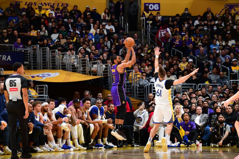 LOS ANGELES, CA - FEBRUARY 6: Gabe Vincent #7 of the Los Angeles Lakers shoots a three point basket during the game against the Golden State Warriors on February 6, 2025 at Crypto.Com Arena in Los Angeles, California. NOTE TO USER: User expressly acknowledges and agrees that, by downloading and/or using this Photograph, user is consenting to the terms and conditions of the Getty Images License Agreement. Mandatory Copyright Notice: Copyright 2025 NBAE (Photo by Adam Pantozzi/NBAE via Getty Images)