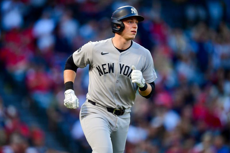 May 27, 2025; Anaheim, California, USA; New York Yankees designated hitter Ben Rice (22) runs after hitting a solo home run against the Los Angeles Angels during the fourth inning at Angel Stadium. Mandatory Credit: Gary A. Vasquez-Imagn Images