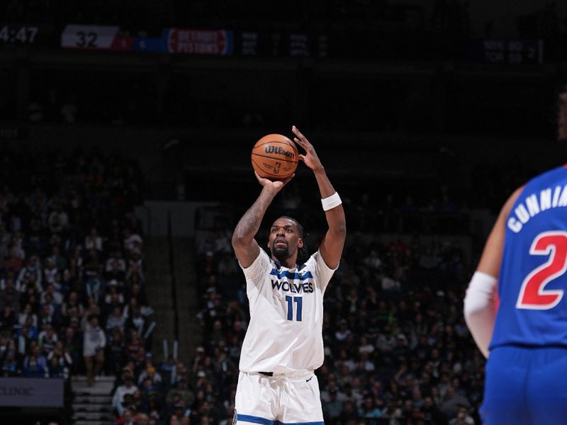 MINNEAPOLIS, MN -  MARCH 27: Naz Reid #11 of the Minnesota Timberwolves shoots a three point basket during the game against the Detroit Pistons  on March 27, 2024 at Target Center in Minneapolis, Minnesota. NOTE TO USER: User expressly acknowledges and agrees that, by downloading and or using this Photograph, user is consenting to the terms and conditions of the Getty Images License Agreement. Mandatory Copyright Notice: Copyright 2024 NBAE (Photo by Jordan Johnson/NBAE via Getty Images)