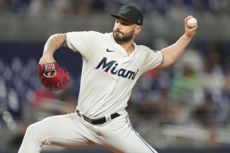 Sep 19, 2023; Miami, Florida, USA;  Miami Marlins relief pitcher Tanner Scott (66) pitches against the New York Mets in the ninth inning at loanDepot Park. Mandatory Credit: Jim Rassol-USA TODAY Sports