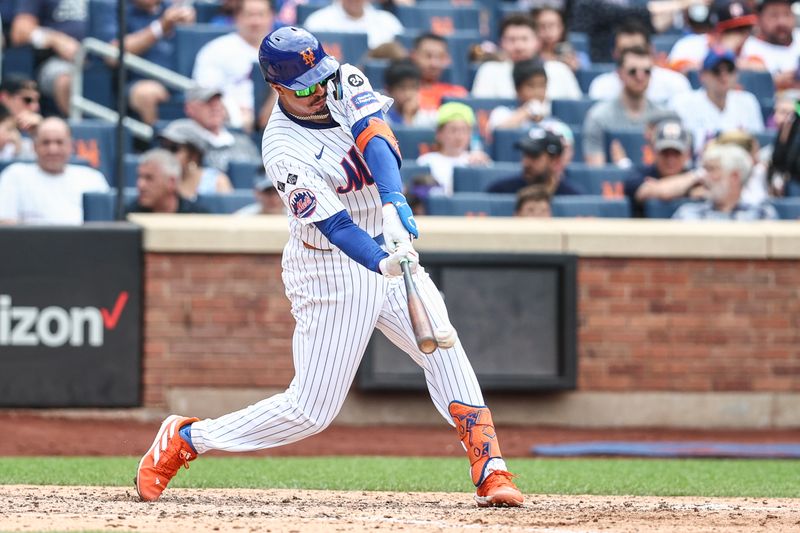 Jun 30, 2024; New York City, New York, USA;  New York Mets third baseman Mark Vientos (27) hits a two RBI double in the sixth inning against the Houston Astros at Citi Field. Mandatory Credit: Wendell Cruz-USA TODAY Sports