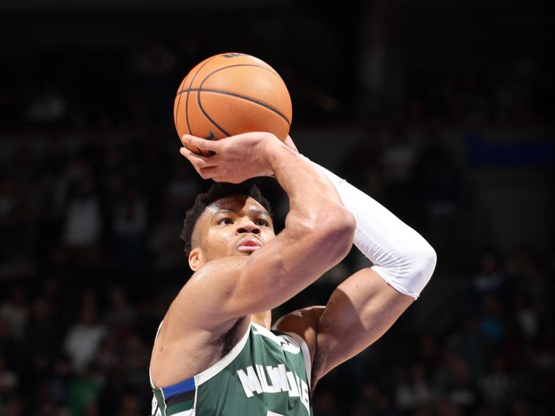 MINNEAPOLIS, MN -  FEBRUARY 23: Giannis Antetokounmpo #34 of the Milwaukee Bucks shoots a free throw during the game on February 23, 2024 at Target Center in Minneapolis, Minnesota. NOTE TO USER: User expressly acknowledges and agrees that, by downloading and or using this Photograph, user is consenting to the terms and conditions of the Getty Images License Agreement. Mandatory Copyright Notice: Copyright 2024 NBAE (Photo by David Sherman/NBAE via Getty Images)