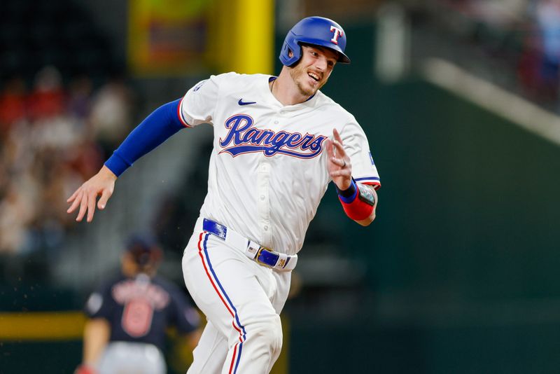 May 15, 2024; Arlington, Texas, USA; Texas Rangers catcher Jonah Heim (28) heads to third base during the sixth inning against the Cleveland Guardians at Globe Life Field. Mandatory Credit: Andrew Dieb-USA TODAY Sports