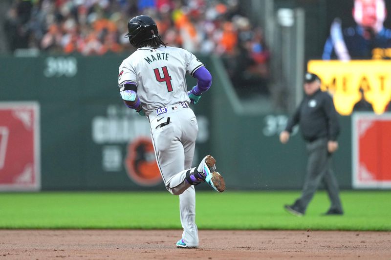 May 10, 2024; Baltimore, Maryland, USA; Arizona Diamondbacks second baseman Ketel Marte (4) rounds the bases following a solo home run in the third inning against the Baltimore Orioles at Oriole Park at Camden Yards. Mandatory Credit: Mitch Stringer-USA TODAY Sports