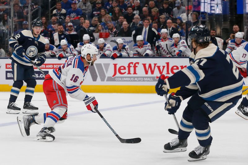 Oct 14, 2023; Columbus, Ohio, USA; New York Rangers center Vincent Trocheck (16) carries the puck as Columbus Blue Jackets defenseman Adam Boqvist (27) defends during the second period at Nationwide Arena. Mandatory Credit: Russell LaBounty-USA TODAY Sports