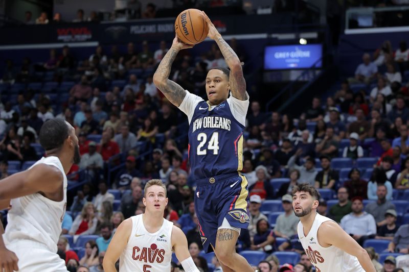 NEW ORLEANS, LOUISIANA - NOVEMBER 06: Jordan Hawkins #24 of the New Orleans Pelicans passes the ball during the first half against the Cleveland Cavaliers at the Smoothie King Center on November 06, 2024 in New Orleans, Louisiana. NOTE TO USER: User expressly acknowledges and agrees that, by downloading and or using this Photograph, user is consenting to the terms and conditions of the Getty Images License Agreement. (Photo by Jonathan Bachman/Getty Images)