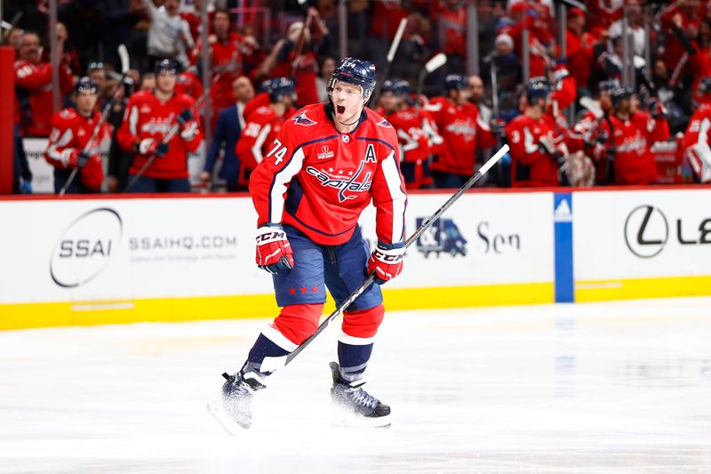 Mar 24, 2024; Washington, District of Columbia, USA; Washington Capitals defenseman John Carlson (74) celebrates after scoring a goal against the Winnipeg Jets during the third period at Capital One Arena. Mandatory Credit: Amber Searls-USA TODAY Sports