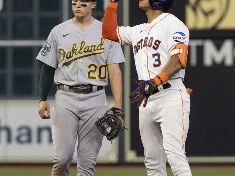 Sep 12, 2023; Houston, Texas, USA; Houston Astros shortstop Jeremy Pena (3) reacts to his double against the Oakland Athletics in the fifth inning at Minute Maid Park. Mandatory Credit: Thomas Shea-USA TODAY Sports