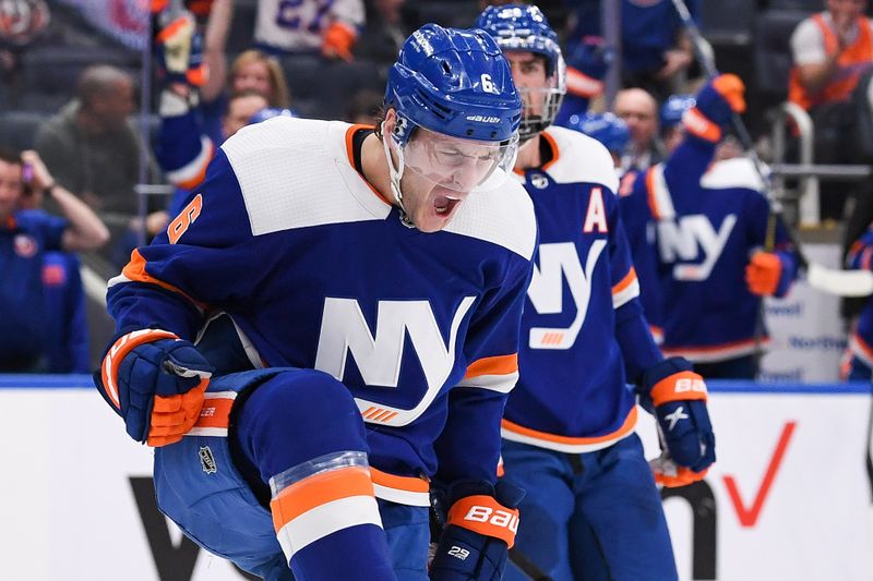 Apr 6, 2023; Elmont, New York, USA; New York Islanders defenseman Ryan Pulock (6) celebrates his goal against the Tampa Bay Lightning during the second period at UBS Arena. Mandatory Credit: Dennis Schneidler-USA TODAY Sports