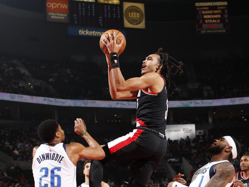 PORTLAND, OR - DECEMBER 1: Dalano Banton #5 of the Portland Trail Blazers drives to the basket during the game against the Dallas Mavericks on December 1, 2024 at the Moda Center Arena in Portland, Oregon. NOTE TO USER: User expressly acknowledges and agrees that, by downloading and or using this photograph, user is consenting to the terms and conditions of the Getty Images License Agreement. Mandatory Copyright Notice: Copyright 2024 NBAE (Photo by Cameron Browne/NBAE via Getty Images)